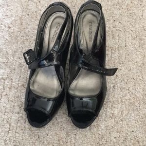 Black strap heels. Size 8.
